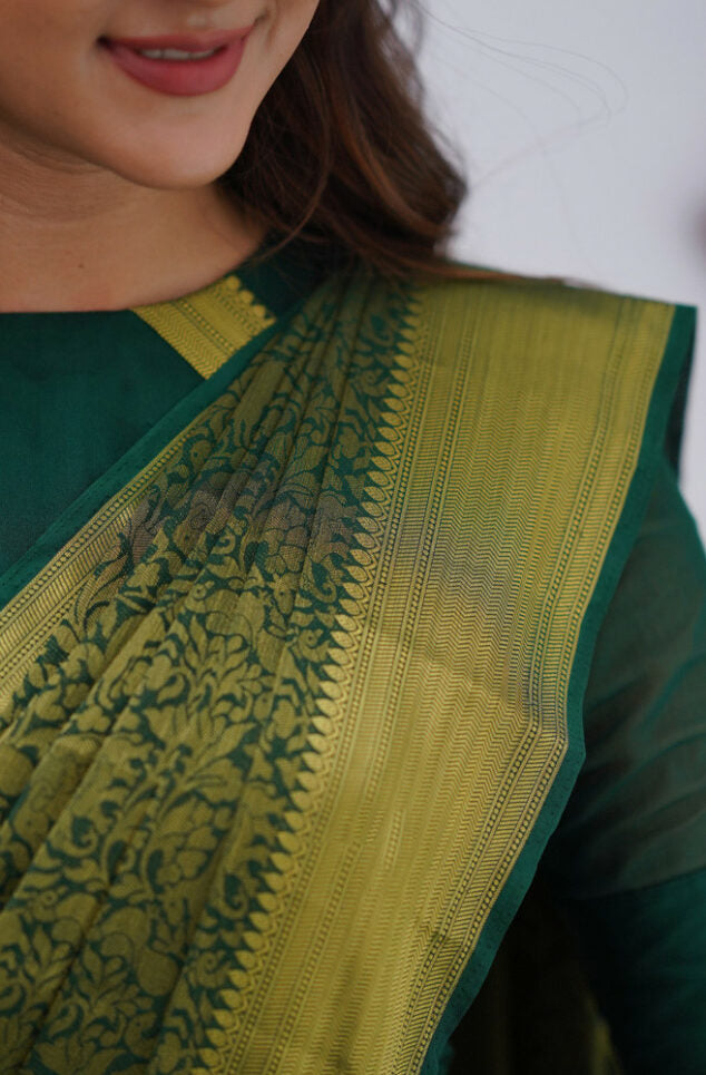 Sonorous Dark Green Soft Silk Saree With Lissome Blouse Piece