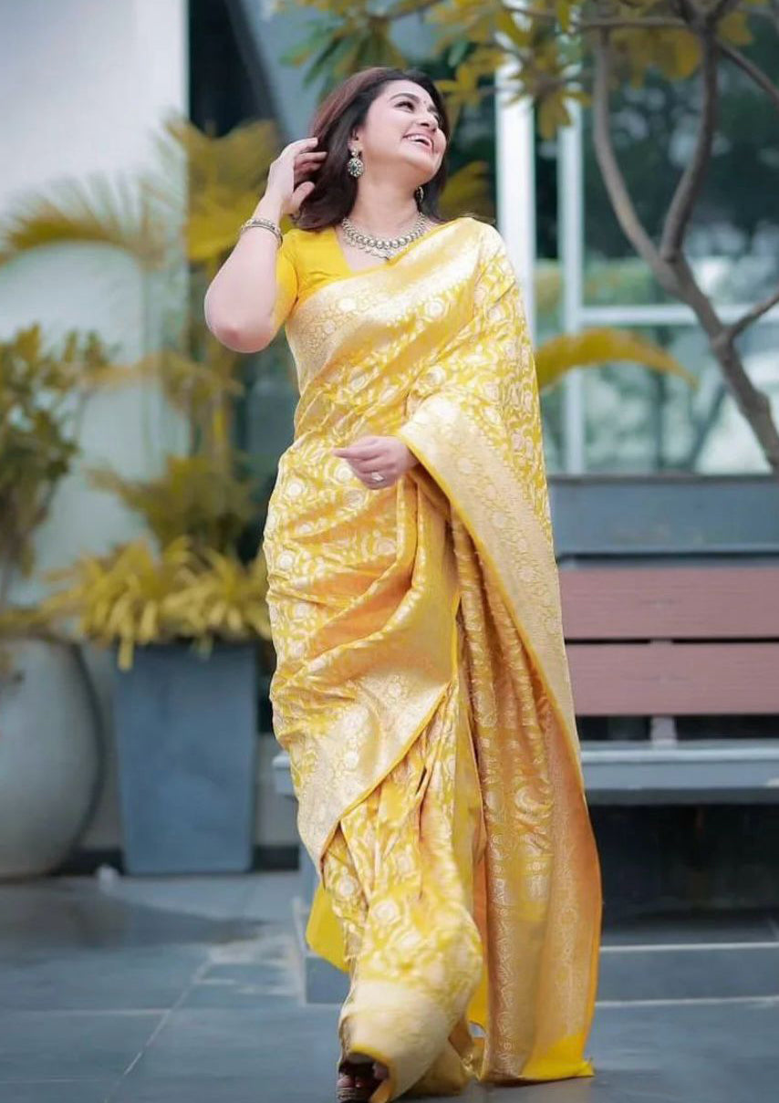 Super extravagant Yellow Soft Silk Saree With Enthralling Blouse Piece