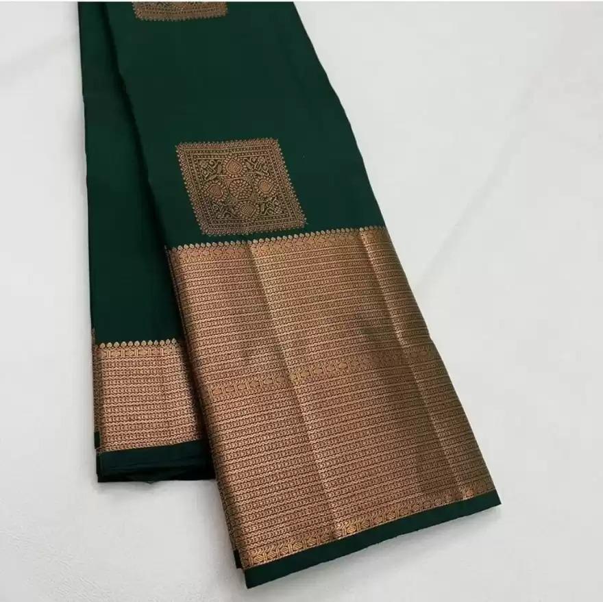 Mesmeric extravagant Dark Green Soft Silk Saree With Sizzling Blouse Piece