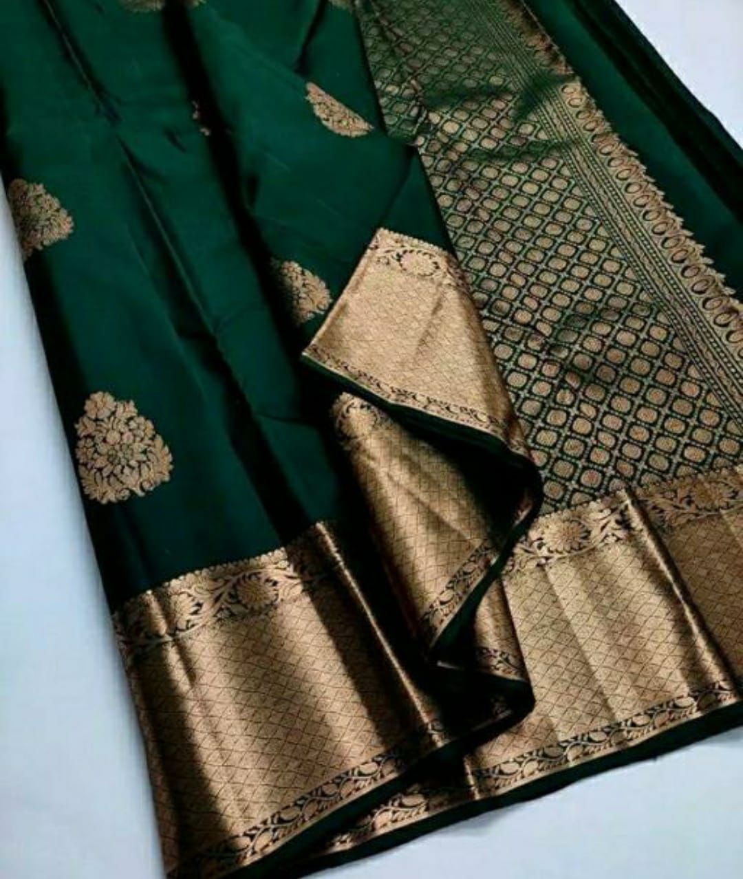 Majesty Dark Green Soft Silk Saree With Eloquence Blouse Piece