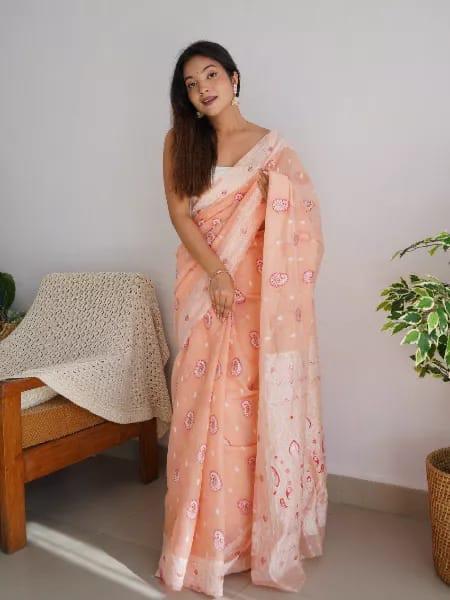 An insanely Peach Cotton Silk Saree With Intricate Blouse Piece