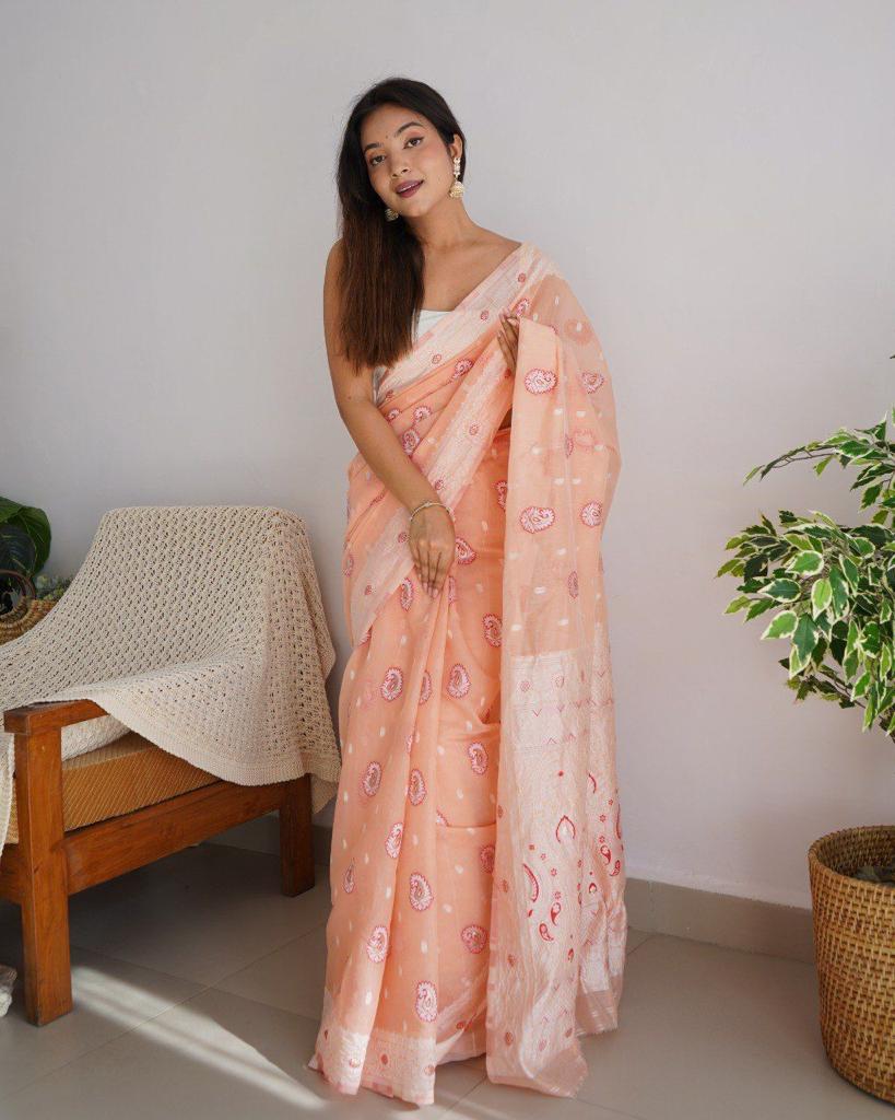 An insanely Peach Cotton Silk Saree With Intricate Blouse Piece