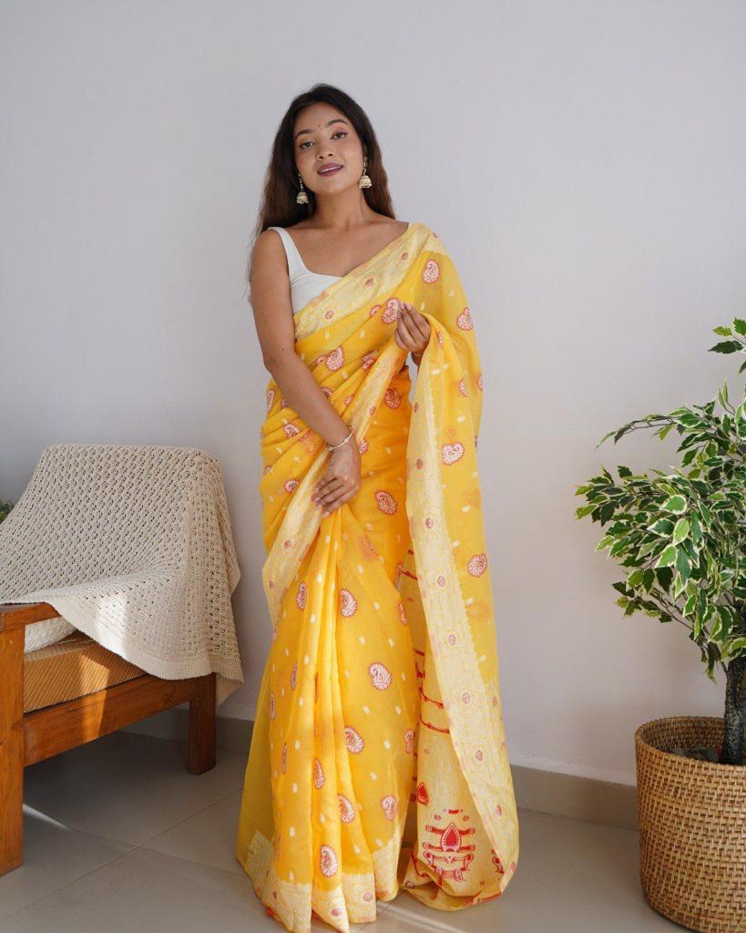 Twirling Yellow Cotton Silk Saree With Demanding Blouse Piece