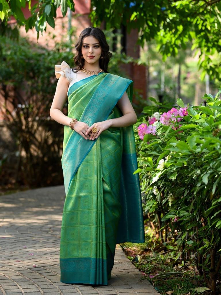 Flaunt Sea Green Soft Banarasi Silk Saree With Elegant Blouse Piece