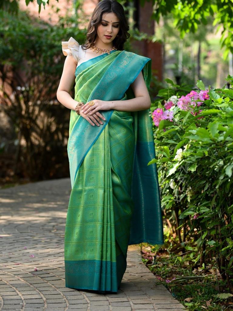 Flaunt Sea Green Soft Banarasi Silk Saree With Elegant Blouse Piece