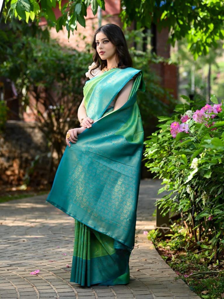 Flaunt Sea Green Soft Banarasi Silk Saree With Elegant Blouse Piece