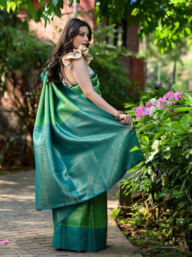 Flaunt Sea Green Soft Banarasi Silk Saree With Elegant Blouse Piece