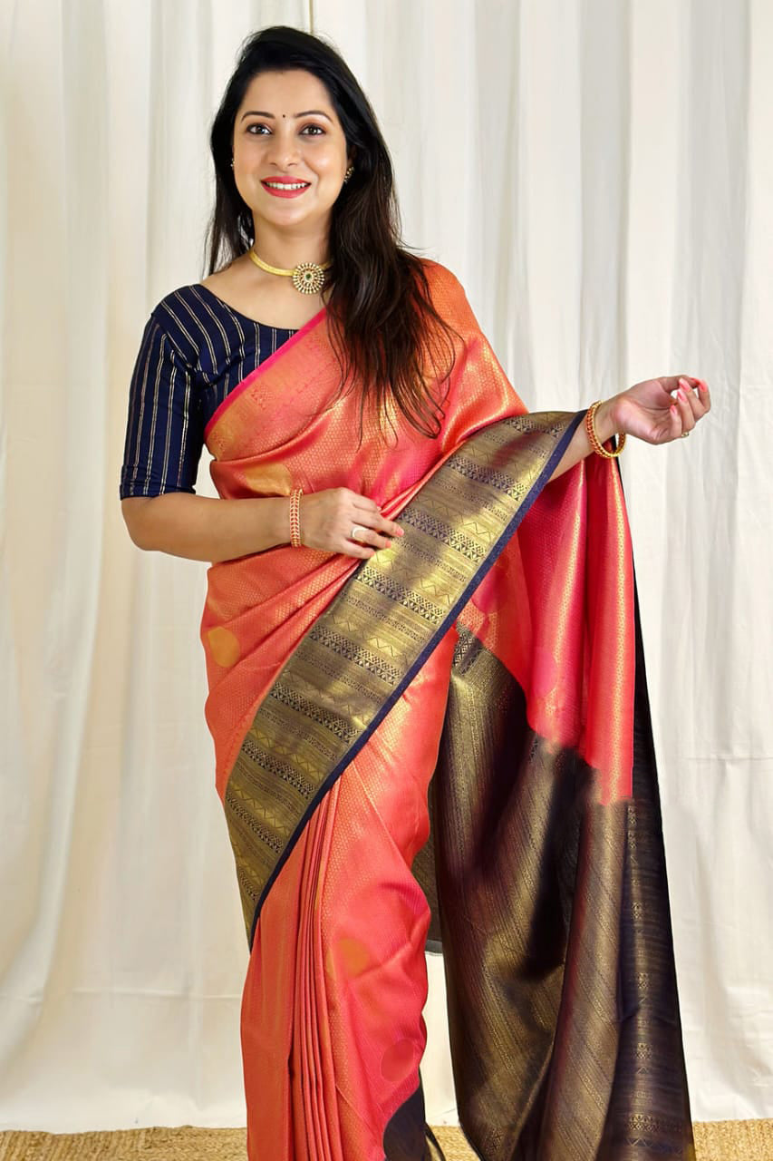 Sempiternal Peach Soft Silk Saree With Gleaming Blouse Piece