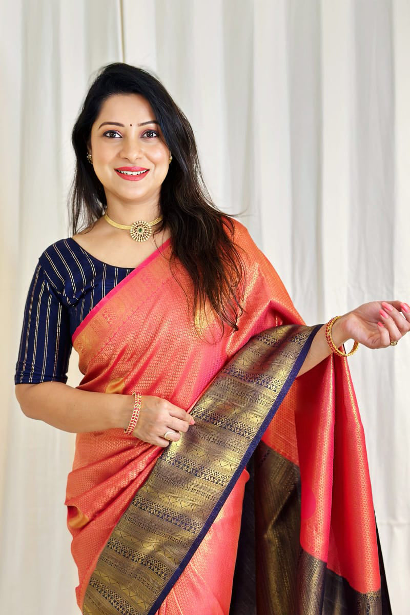 Sempiternal Peach Soft Silk Saree With Gleaming Blouse Piece