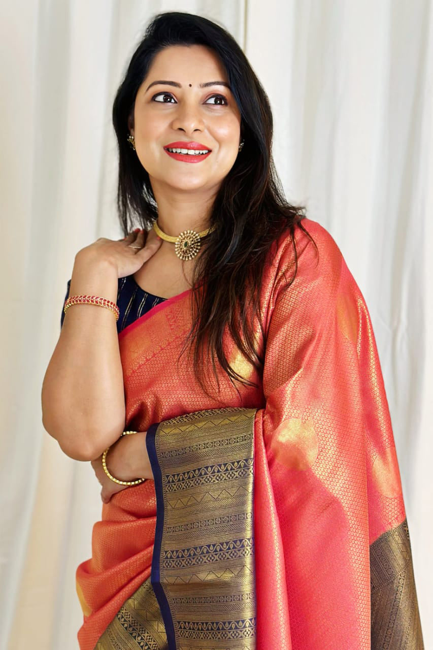 Sempiternal Peach Soft Silk Saree With Gleaming Blouse Piece