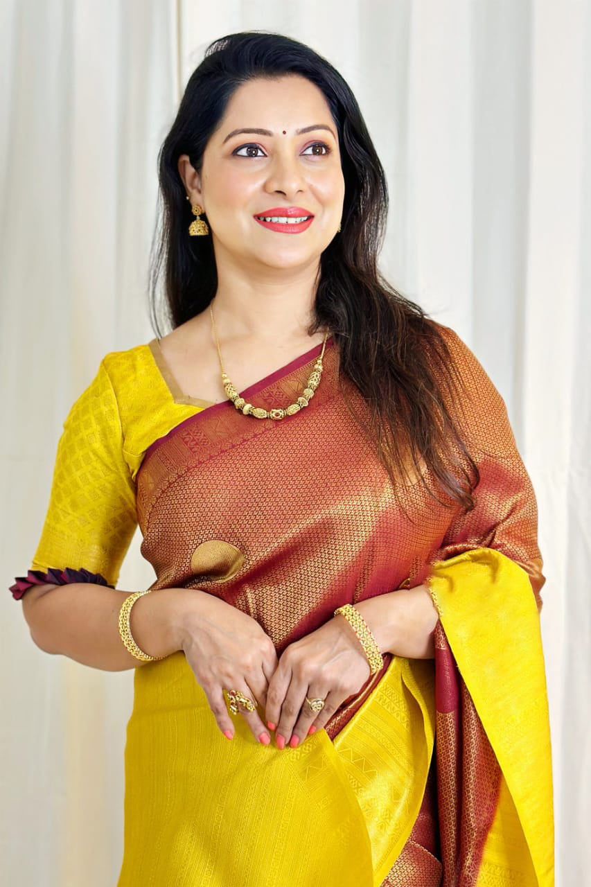 Moiety Yellow Soft Silk Saree With Precious Blouse Piece