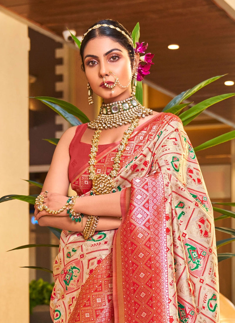 Traditional Beige Patola Silk Saree with Marvellous Blouse Piece