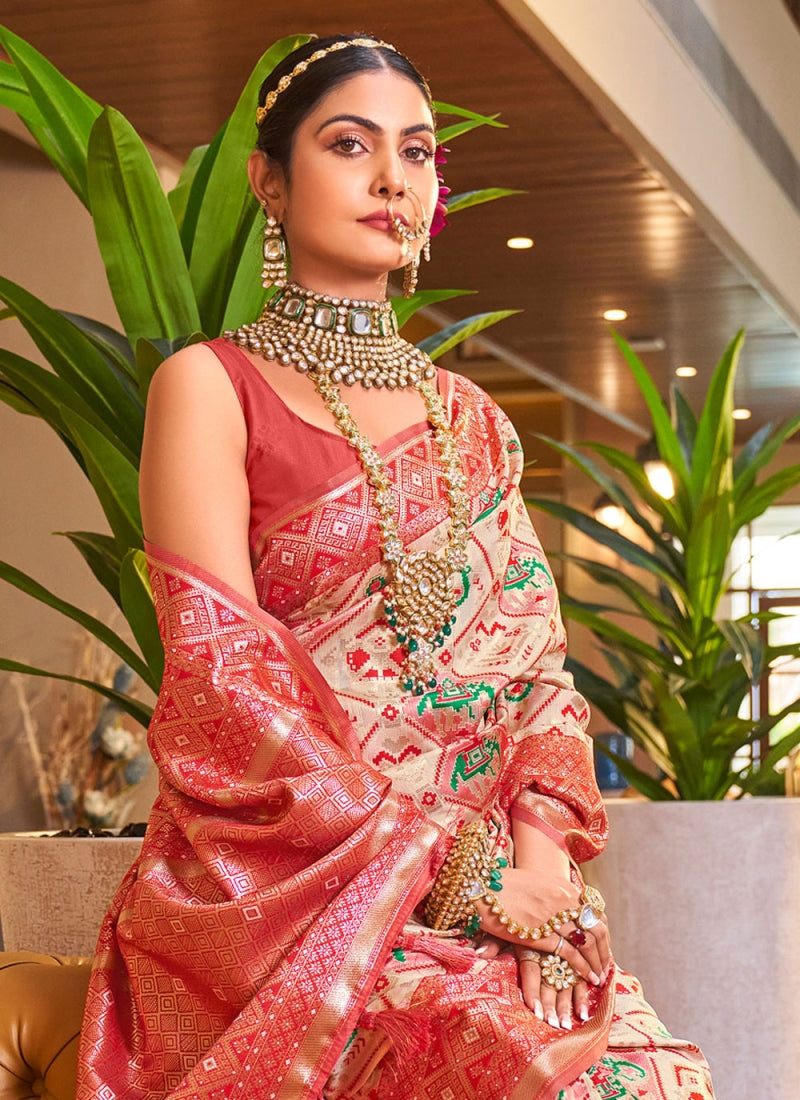 Traditional Beige Patola Silk Saree with Marvellous Blouse Piece