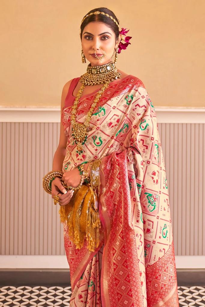 Traditional Beige Patola Silk Saree with Marvellous Blouse Piece