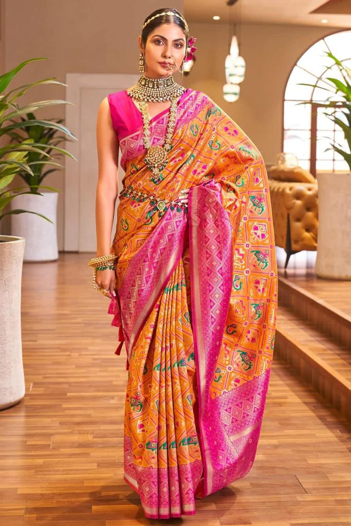 Stunner Orange Patola Silk Saree with Stunning Blouse Piece