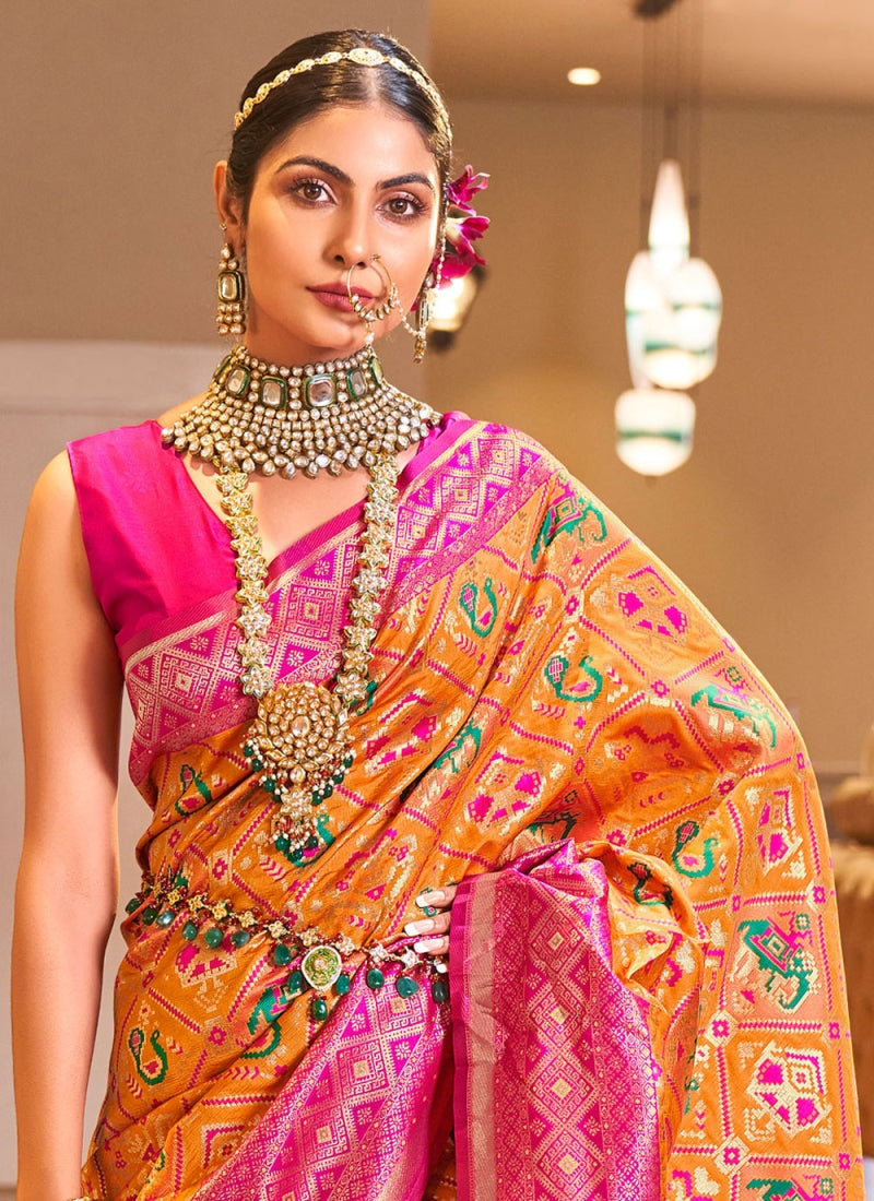 Stunner Orange Patola Silk Saree with Stunning Blouse Piece