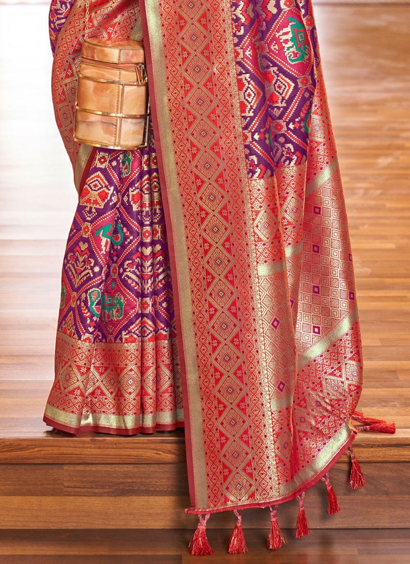 Pleasant Purple Patola Silk Saree with Nectarous Blouse Piece