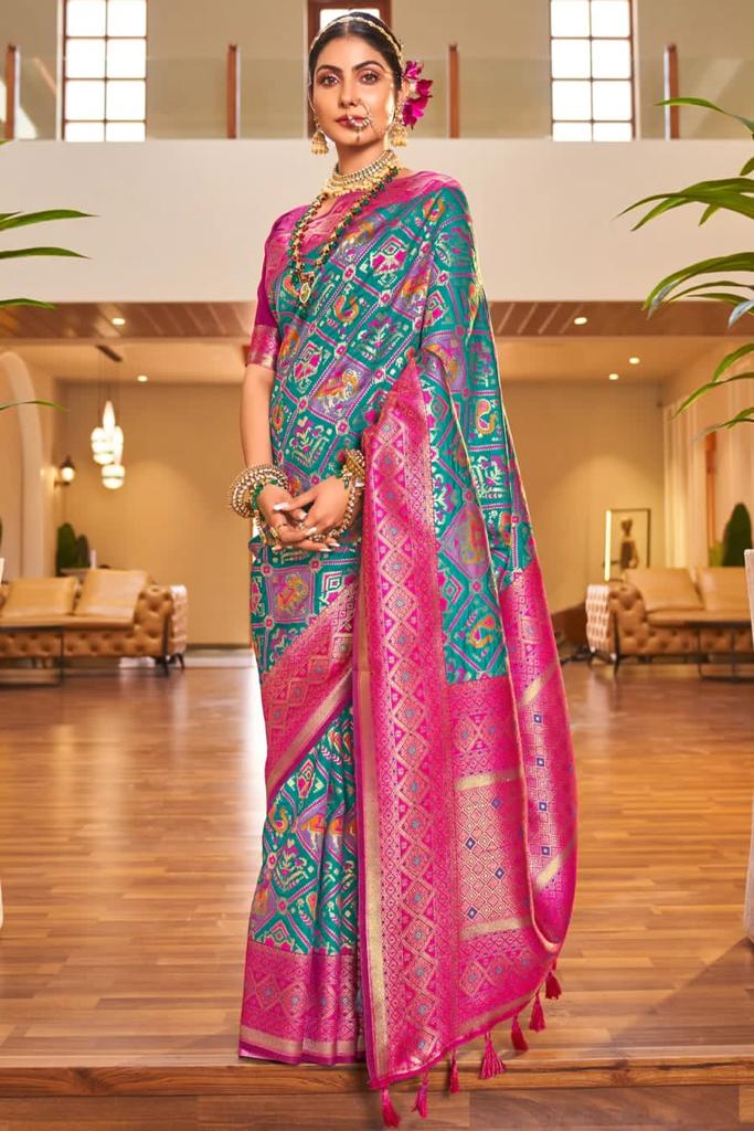 Desirable Turquoise Patola Silk Saree with Trendy Blouse Piece