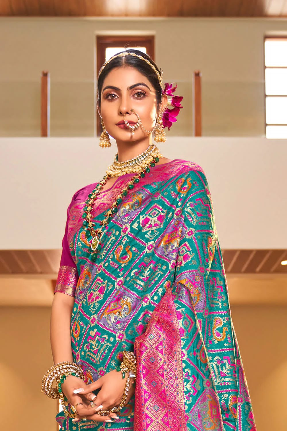 Desirable Turquoise Patola Silk Saree with Trendy Blouse Piece