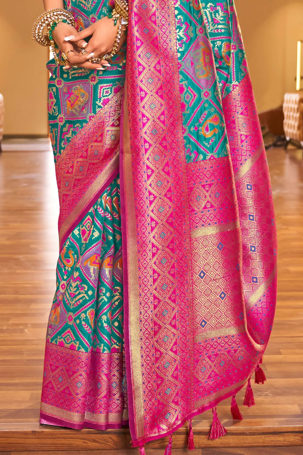 Desirable Turquoise Patola Silk Saree with Trendy Blouse Piece