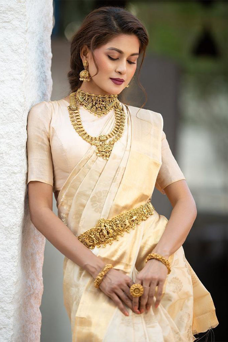 Quixotic Beige Soft Banarasi Silk Saree With Tempting Blouse Piece