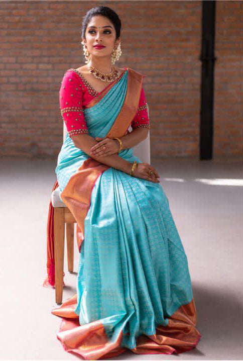 Beguiling Firozi Soft Silk Saree With Rhapsodic Blouse Piece