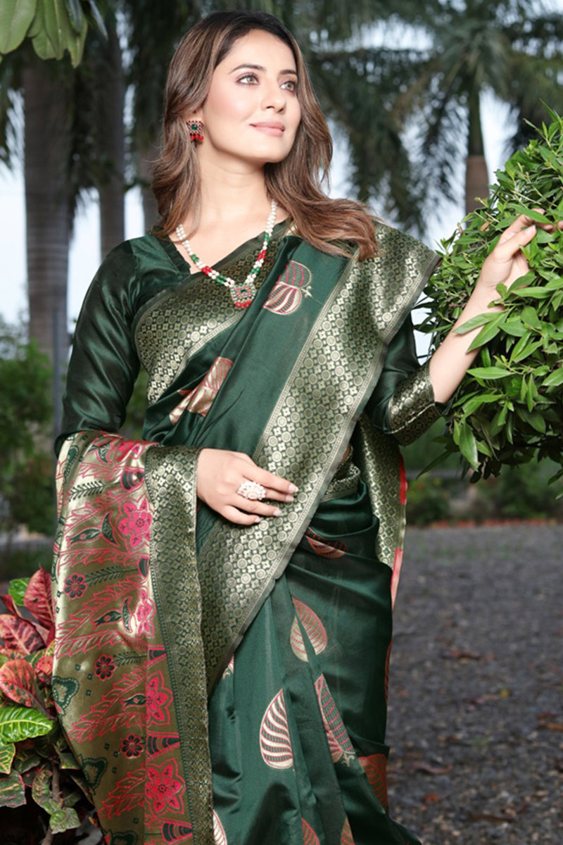 Intricate Dark Green Soft Banarasi Silk Saree With Trendy Blouse Piece