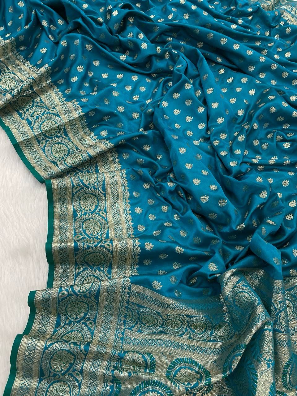 Traditional Firozi Soft Banarasi Silk Saree With Fantabulous Blouse Piece