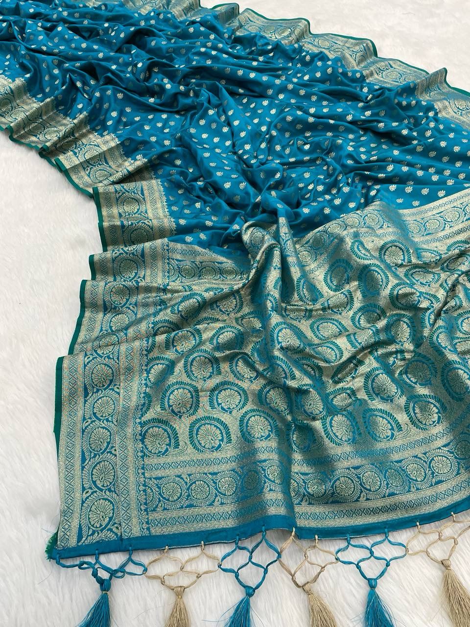 Traditional Firozi Soft Banarasi Silk Saree With Fantabulous Blouse Piece