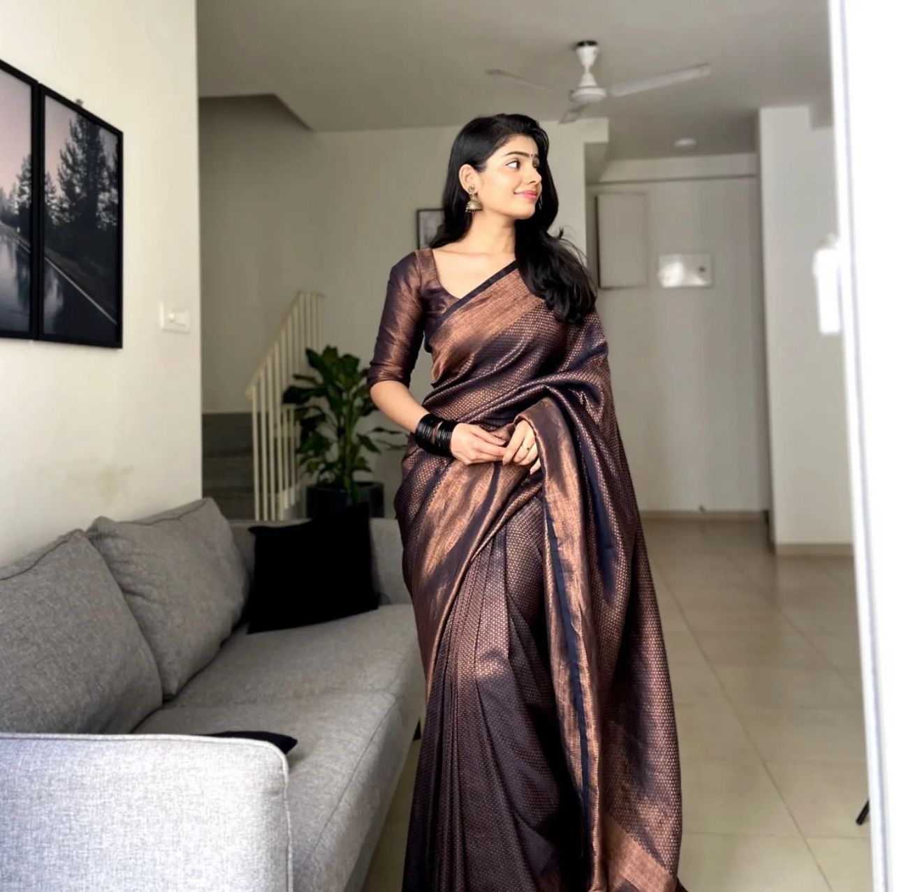 Adorning Black Soft Silk Saree With Deserving Blouse Piece