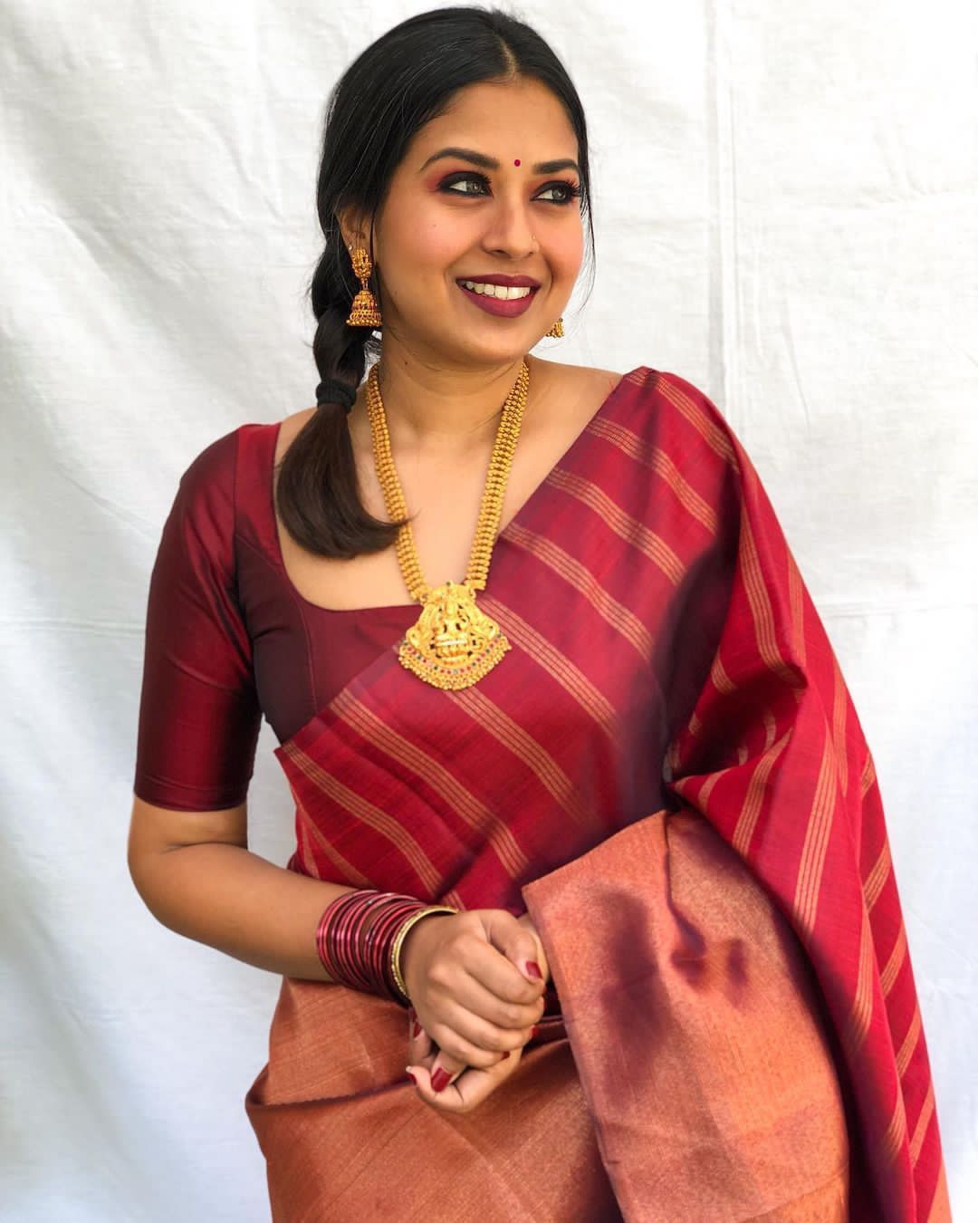 Ideal Maroon Soft Silk Saree with Assemblage Blouse Piece