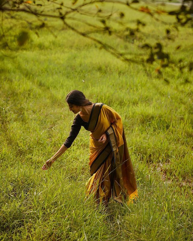 Divine Yellow Soft Banarasi Silk Saree With Efflorescence Blouse Piece