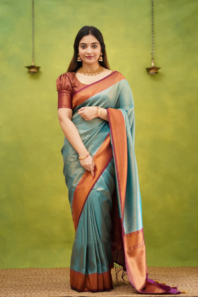 Prodigal Firozi Soft Banarasi Silk Saree With Demure Blouse Piece