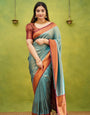 Prodigal Firozi Soft Banarasi Silk Saree With Demure Blouse Piece