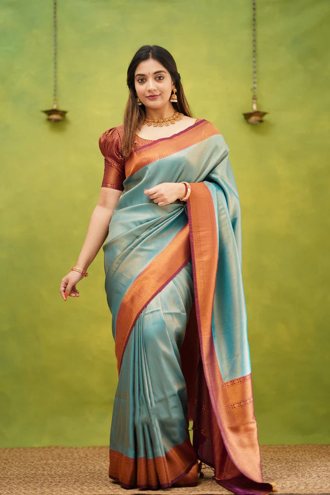 Prodigal Firozi Soft Banarasi Silk Saree With Demure Blouse Piece