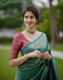 Beguiling Rama Soft Silk Saree with Impressive Blouse Piece