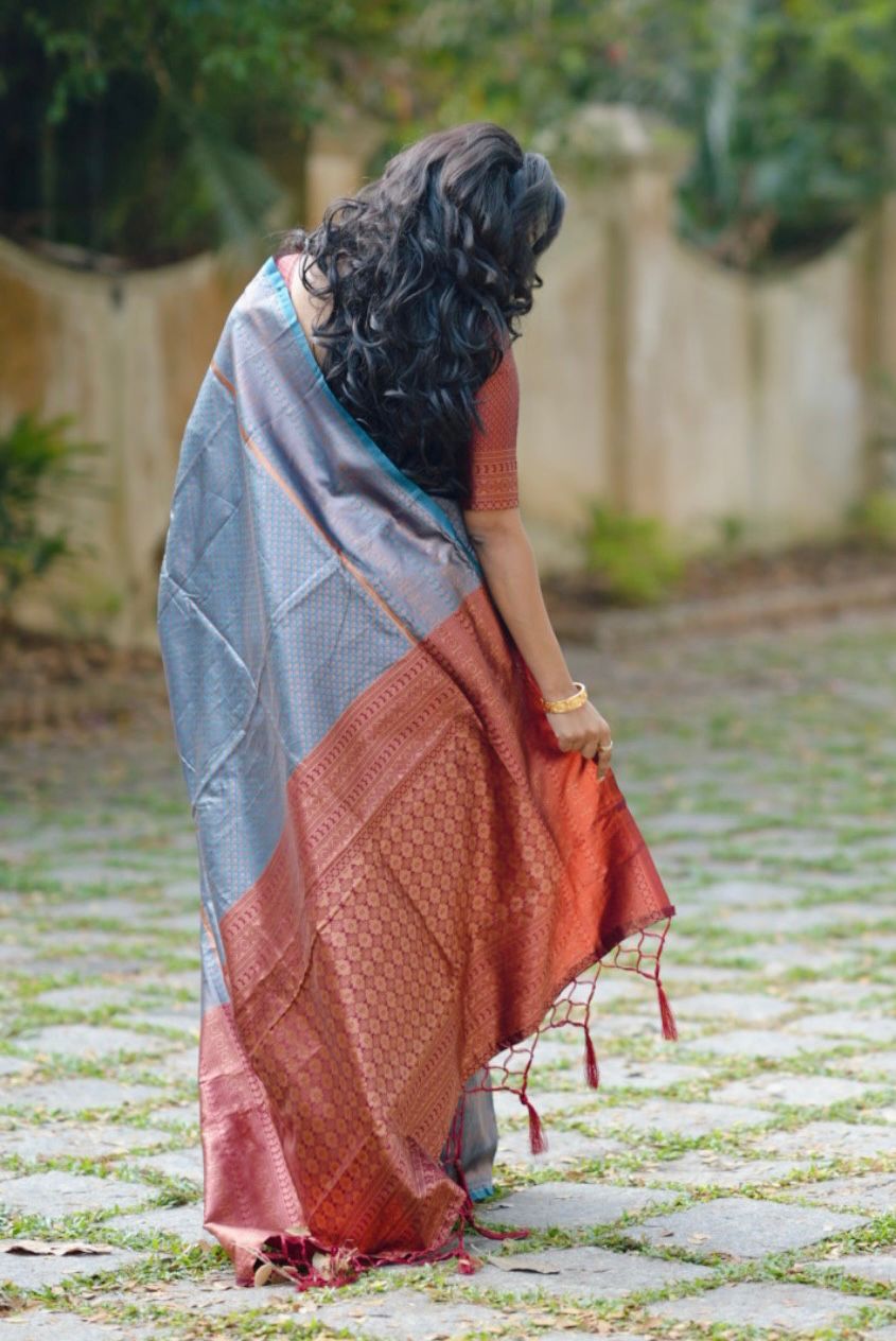 Sizzling Firozi Soft Silk Saree with Super Confounding Blouse Piece