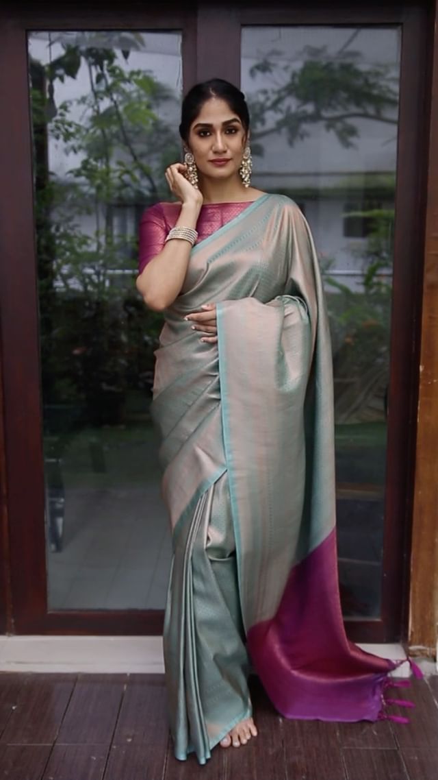 Effulgent Sea Green Soft Silk Saree with Super Ornate Blouse Piece