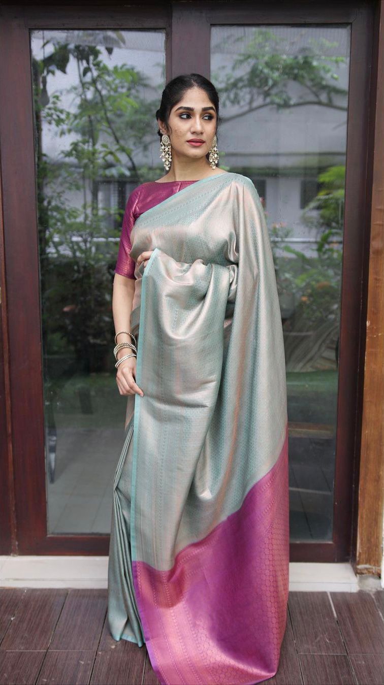 Effulgent Sea Green Soft Silk Saree with Super Ornate Blouse Piece