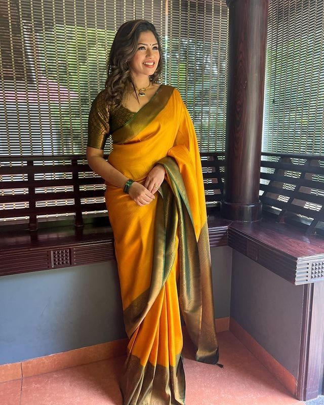 Glowing Yellow Soft Silk Saree with Hypnotic Blouse Piece