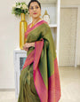 Unique Green Soft Silk Saree With Ravishing Blouse Piece