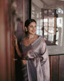 Eloquence Grey Soft Silk Saree With Mesmeric Blouse Piece