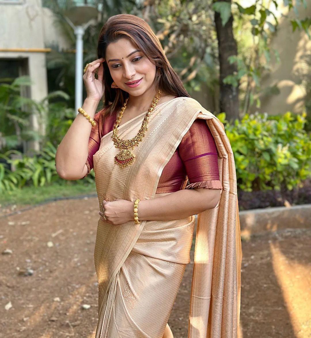 Most Flattering Cream Soft Silk Saree With Pleasant Blouse Piece