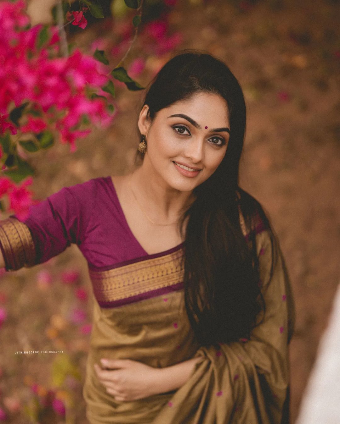 Ornate Dark Beige Soft Silk Saree With Radiant Blouse Piece