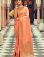 Redolent Peach Soft Banarasi Silk Saree With Divine Blouse Piece