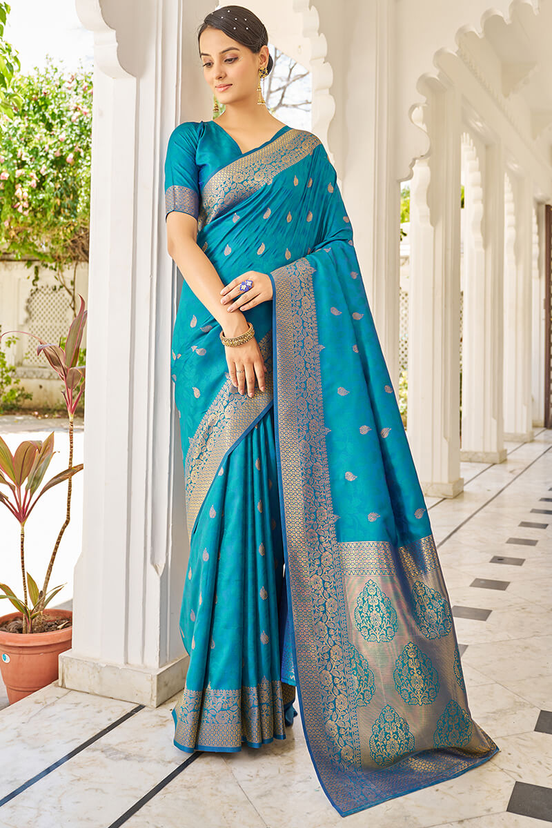 Hypnotic Firozi Kanjivaram Silk Saree With Denouement Blouse Piece