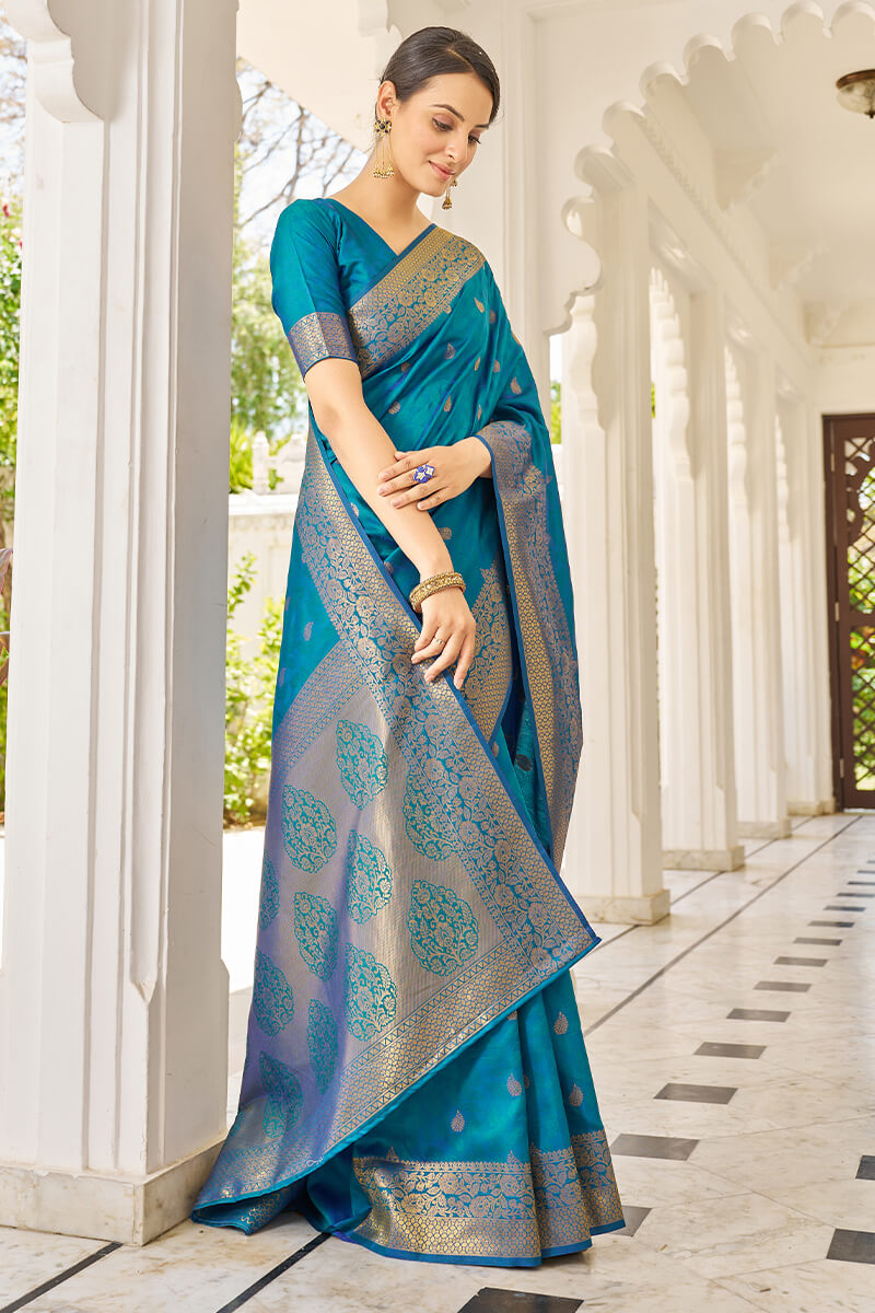 Hypnotic Firozi Kanjivaram Silk Saree With Denouement Blouse Piece