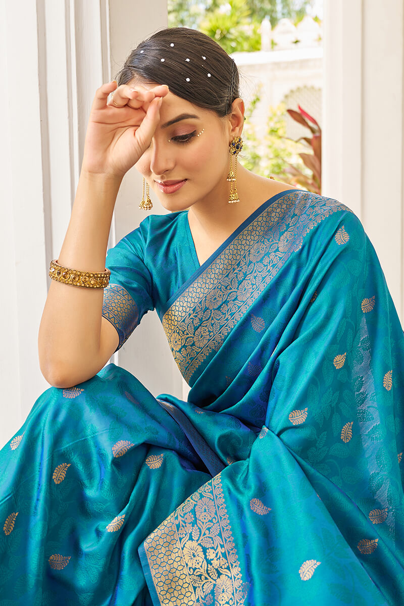 Hypnotic Firozi Kanjivaram Silk Saree With Denouement Blouse Piece