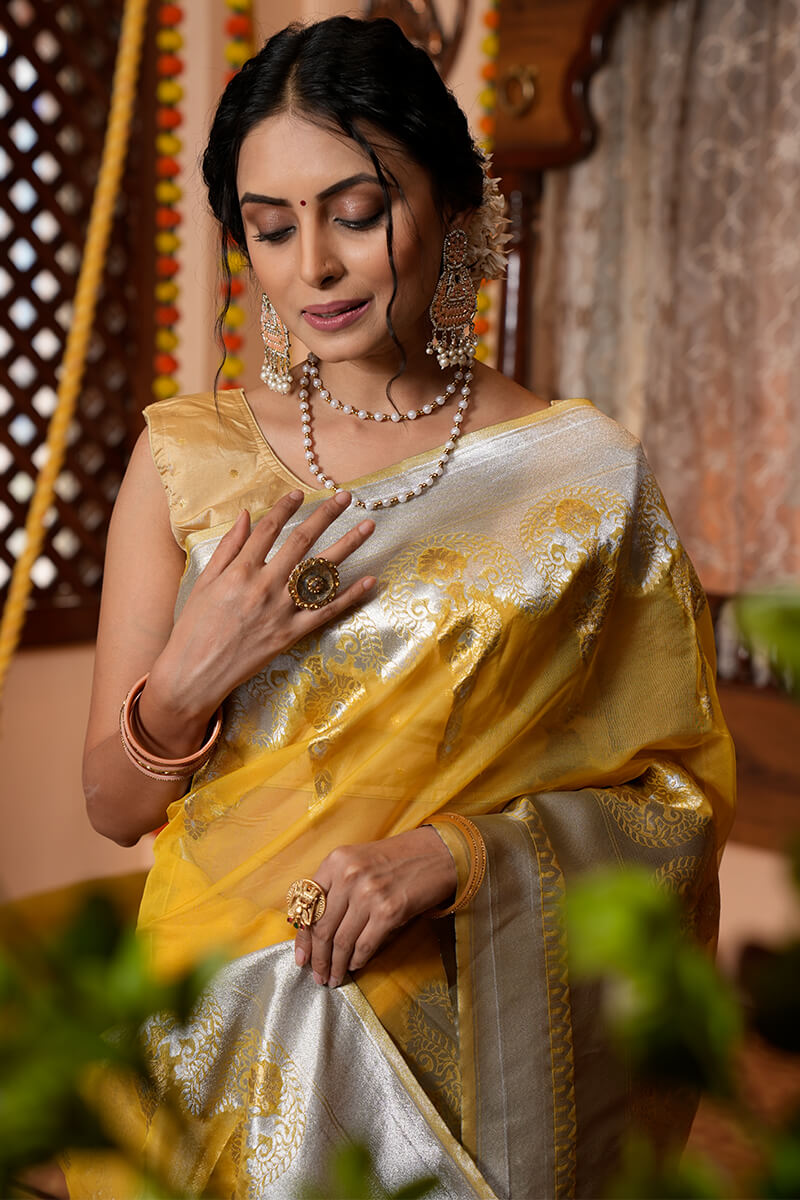 Demesne Mustard Organza Silk Saree With Radiant Blouse Piece