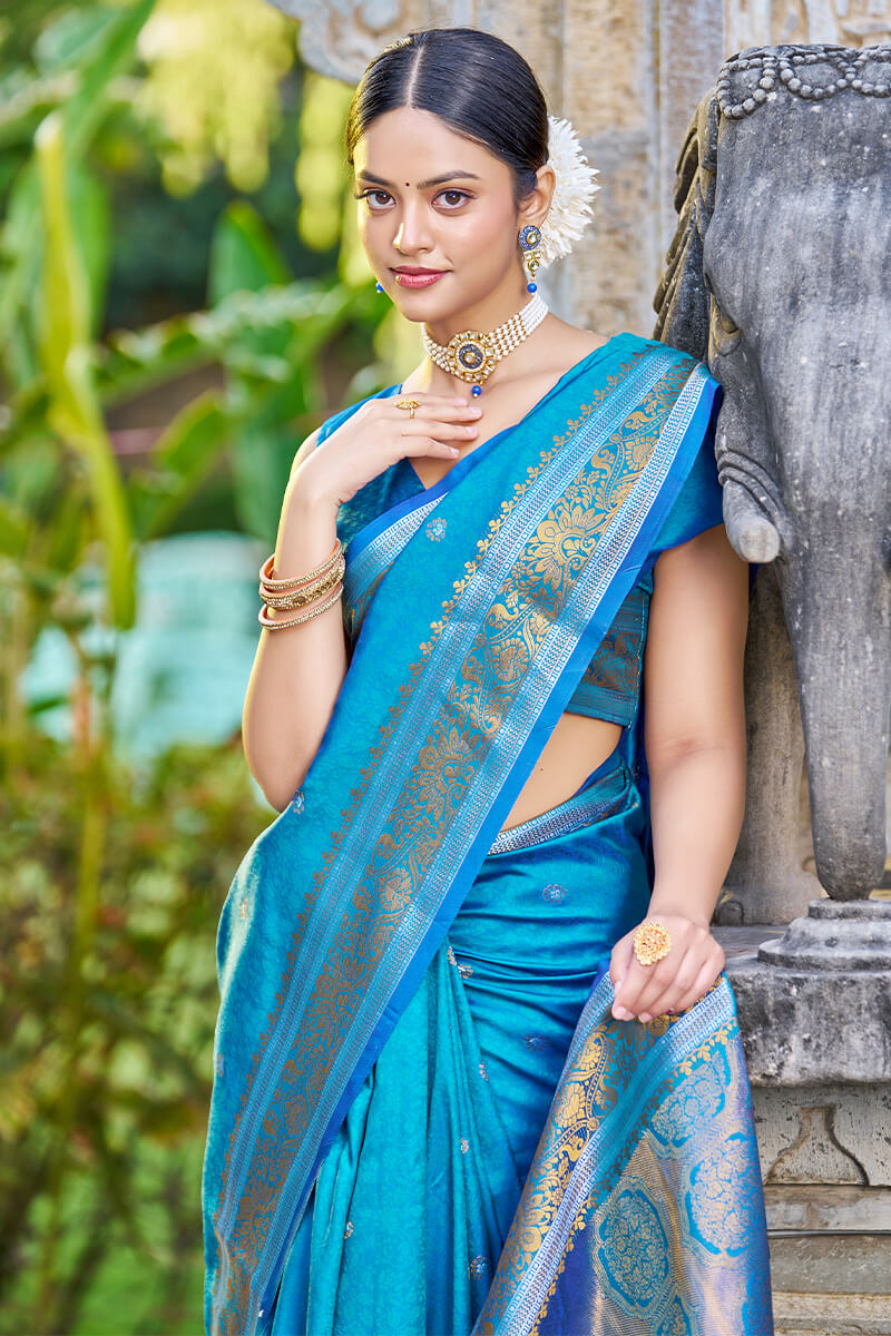 Desiring Firozi Kanjivaram Silk Saree With Serendipity Blouse Piece